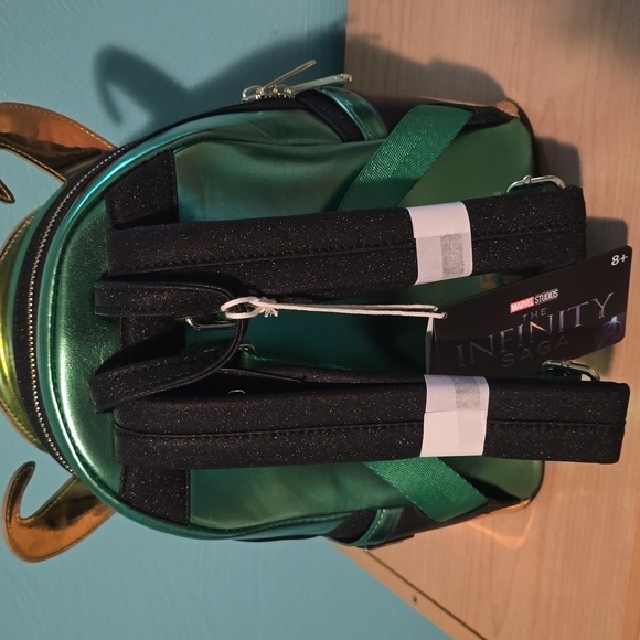 Loungefly Green and Gold Backpack with Horned Design